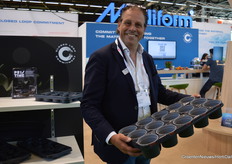 Kees van Beek shows off Modiform's Shuttle Tray.